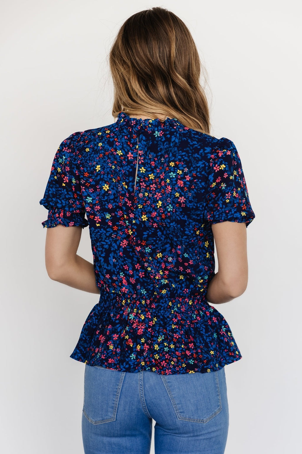Beth Peplum Top | Blue Multi